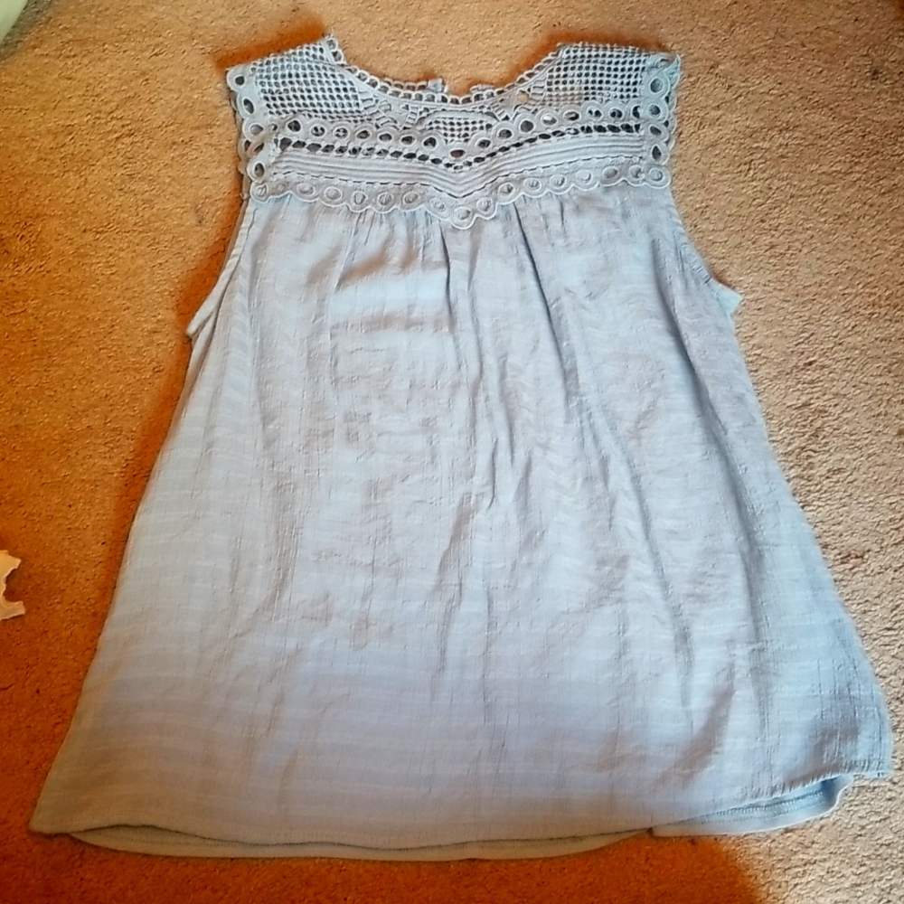 Baby blue sleeveless shirt, Size small